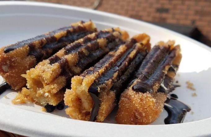 Churros  · Fried pastry dough rolled in cinnamon sugar served with chocolate Abuelita compote.