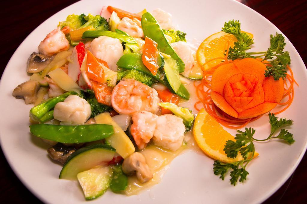 Fruit of the Sea · Fresh scallops, jumbo shrimp and crab meat with vegetable in white sauce.