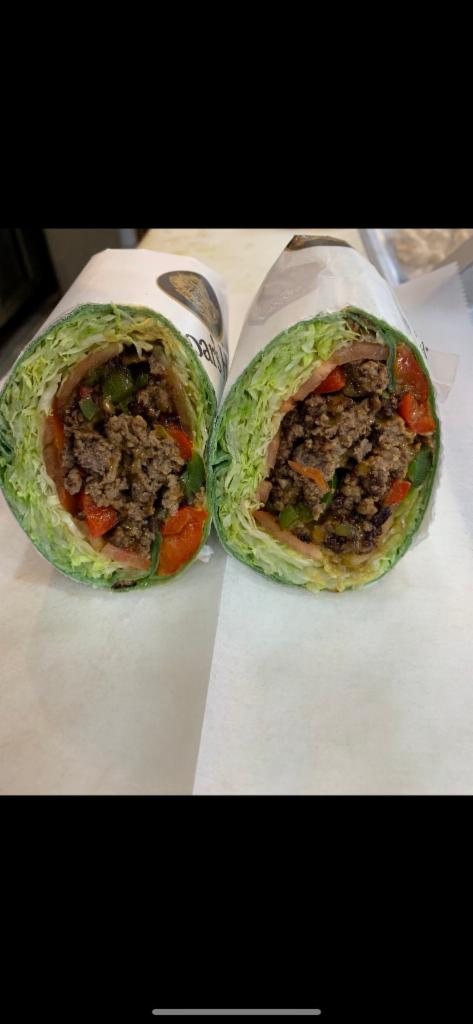4. Philly Cheesesteak · Steak, cheese, peppers, onions, lettuce, and tomatoes.