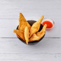 14c. Crab Rangoon · 10 pieces. Fried wonton wrapper filled with crab and cream cheese. 
