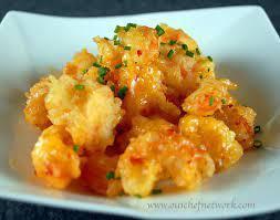 Crispy Rocky Shrimp* · Signature shrimp tempura tossed w. sweet & spicy sc. & sesame seeds.