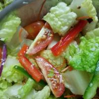 Garden Salad · Includes:
mixed greens, red onion, tomato, and your choice of dressing served on the side.