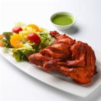 Chicken Leg Tandoori · Spicy yogurt marinade then grilled in this authentic tandoori chicken cooked in a clay oven.
