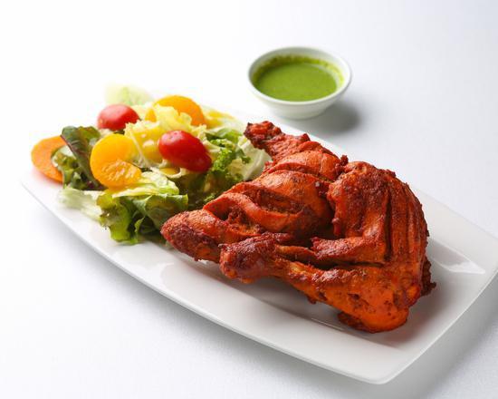Chicken Leg Tandoori · Spicy yogurt marinade then grilled in this authentic tandoori chicken cooked in a clay oven.