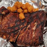 Korean BBQ Pork Spare Ribs · Half or Full Rack Slow cooked Korean Spare Ribs. Spicy or Mild served with tater tots.