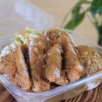 DonKatsu Curry · Panko breaded pork tenderloin deep fried to golden brown served with rice and curry.