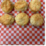  Cheddar Biscuits  · 6 biscuits with honey and butter.