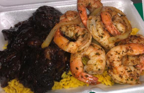 Oxtail and Shrimp  over Rice · Oxtail & sauteed shrimp over rice.