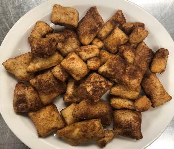 Pizza Fritta · Fried dough with cinnamon and sugar.