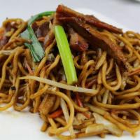 72. Beef Chow Fun · Stir fried vegetables and noodles.