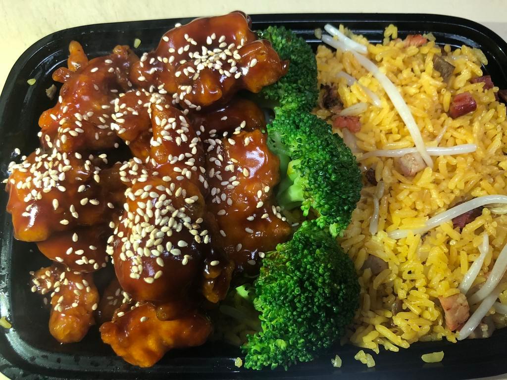C25. Sesame Chicken Combo Plate · Served with egg roll and pork fried rice.