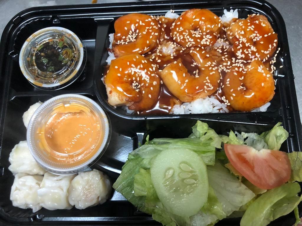 D7. Shrimp Teriyaki Combo · Served with salad and rice and steamed or fried shumai.