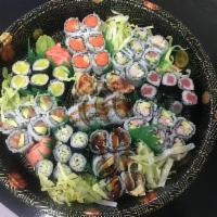 Sushi Party A Platter · Cucumber roll, tuna roll, spicy tuna roll, eel avocado roll, shrimp tempura, California roll...