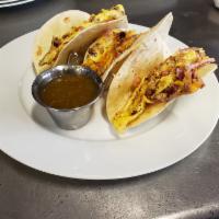 Oak Acres Morning Tacos Breakfast  · Served with brisket, eggs, red onion, smoked salsa relish and cheddar cheese.