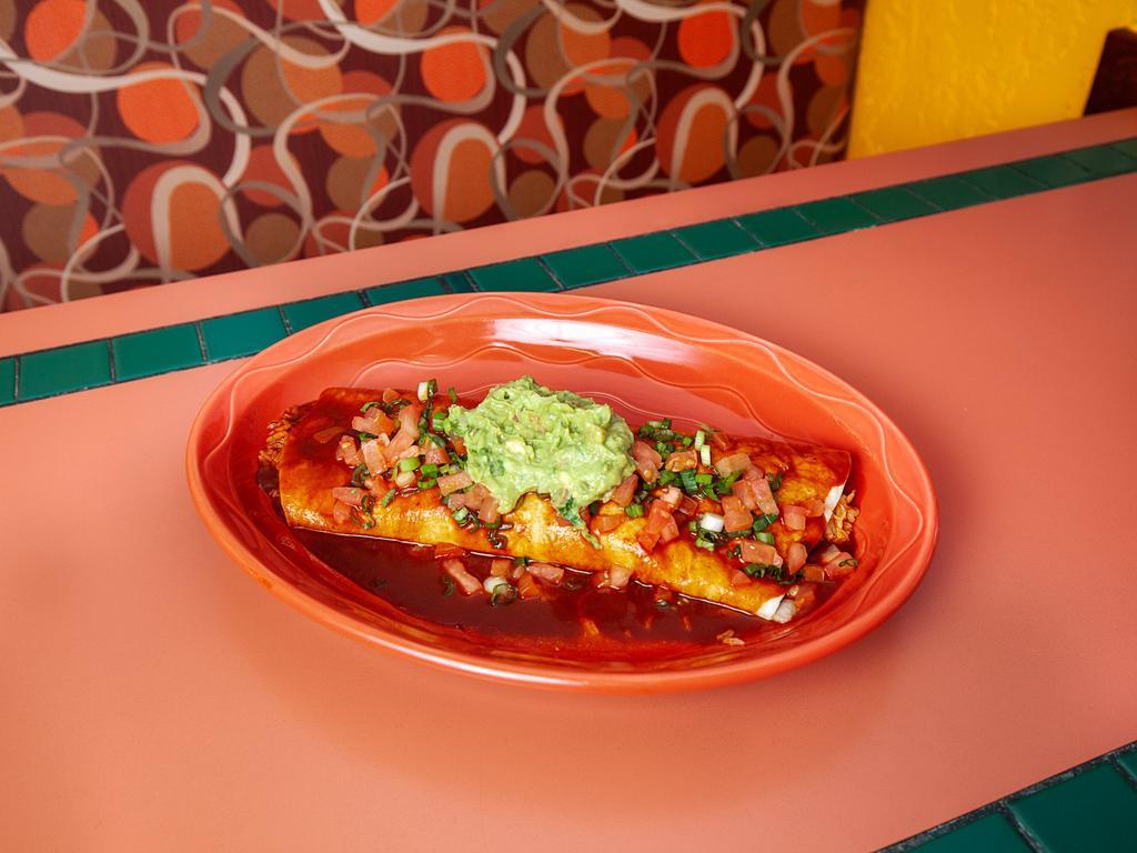 Expresso Burrito · flour tortilla filled with Spanish rice and refried beans with your choice of meat (beef, chicken or pork). Topped with onions, guacamole, tomatoes  and enchilada sauce.