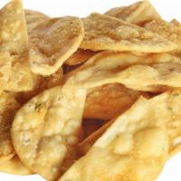 seasoned pita chips · fried pita chips, tossed in a garlic salt and vegetable blended seasoning