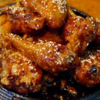 Tokyo Wings · Deep-fried chicken wings with special sauce.