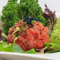 Tuna Tartar · Chopped tuna mixed with avocado, crunch, tobiko, and special sauce