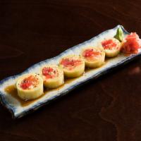 Tri Color Naruto Roll · Salmon, tuna and yellowtail, wrapped in cucumber, topped with tobiko.