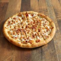 Chicken Bacon Ranch Pizza · A layer of garlic sauce lopped with chicken, bacon, mozzarella and swirled with ranch dressi...