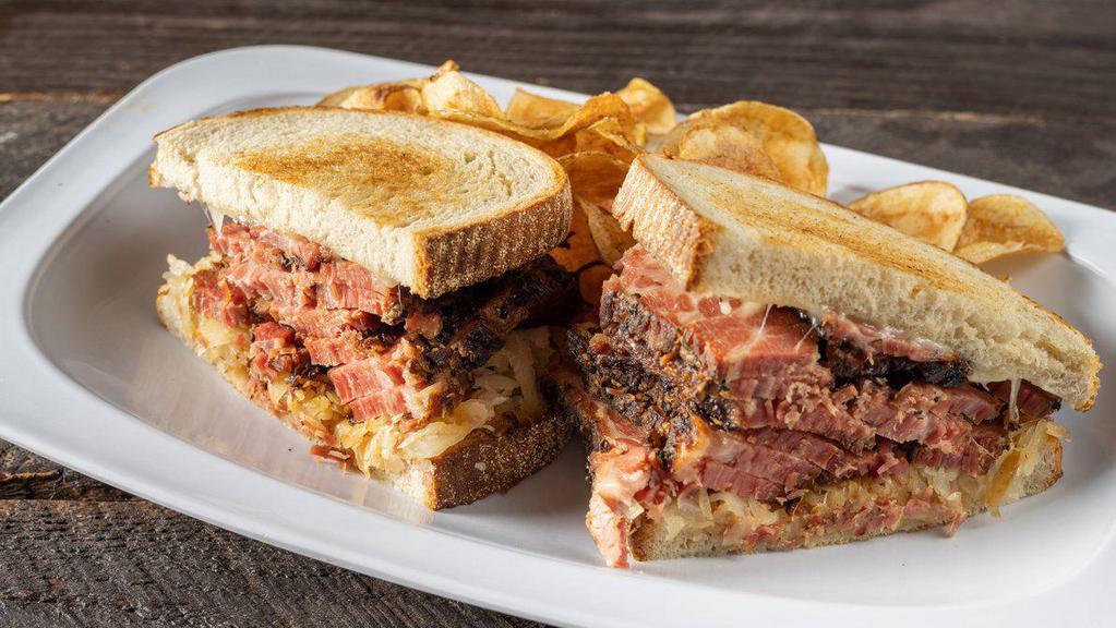 Artisan Smoked Pastrami Piled High · Piled high classically seasoned, fork-tender, and choice of rye or baguette. Add-ons are available for an additional charge. 