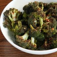 Organic Tumeric Tahini Broccoli · Org. broccoli, tahini base, lemon juice, EVOO, maple syrup, ginger juice, salt, tumeric, pic...