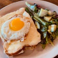 Croque Madame Lunch · Ham, Swiss cheese, bechamel and sunny side up egg open sandwich.
