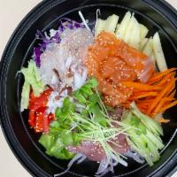 B2. Mul Hwae Bowl 물회 · Assorted sashimi with spicy watery sauce.
