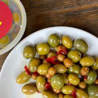 Marinated Olives · olives marinated in olive oil, garlic, lemon, calabrian chili, oregano