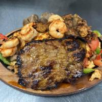 Tequilas Fajita · Steak, chicken, and shrimp grilled with mushrooms, onions, bell peppers, broccoli, carrots, ...