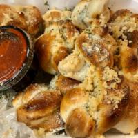 Garlic Knots · Served with a side of marinara.