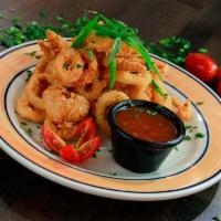 Calamares Caribenos · Juicy and fresh fried calamari.