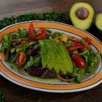 Ensalada con Aguacate · Fresh avocado, romaine lettuce, julienne peppers, cherry tomatoes and cilantro with French h...