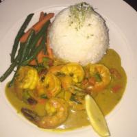 Coconut Curry Shrimp · Served with white tiger shrimp, sauteed vegetables and steamed jasmine rice.
