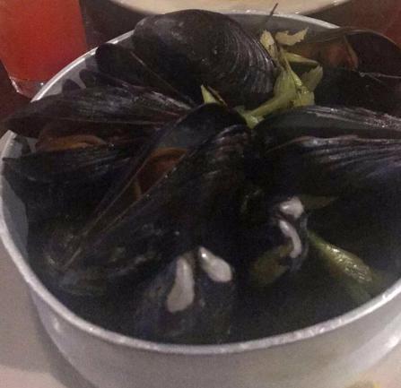 Trelawni Drunken Mussels · Steamed with Island beer, celery and shallots served with French fries.