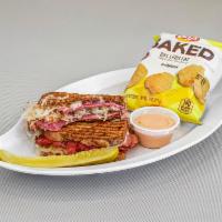 Reuben panini · Corned beef, Sauerkraut,swiss cheese, thousand island dressing,on Rye bread