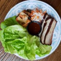 BBQ Pork Belly Lettuce Wraps · with Butter Lettuce, Choi's Kimchi, Pickled Carrots + Daikons, Cilantro, and Gochujang