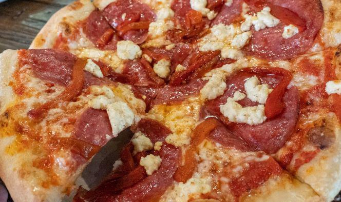 Salami Pie · Tomato Sauce, Mozzarella, Salami, Ricotta, Roasted Red Peppers, Drizzled with Spicy Honey