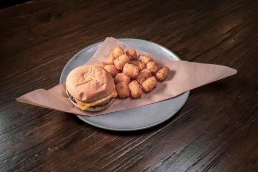 Kid's Cheeseburger · A kid's size burger with American cheese and fries.