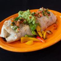 Vegan Burrito · Grilled fajita veggies, rice, beans, guacamole and pico.