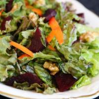 Mixed Baby Greens · With a sherry vinaigrette.