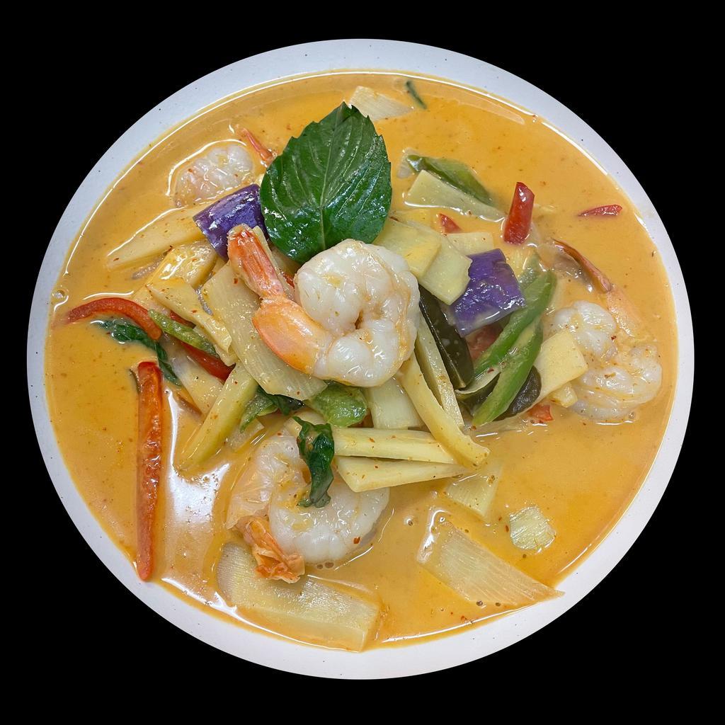 Red Curry · Coconut milk, curry paste with bamboo shoots, fresh basil leaves, bell peppers and eggplants. Gluten-free.