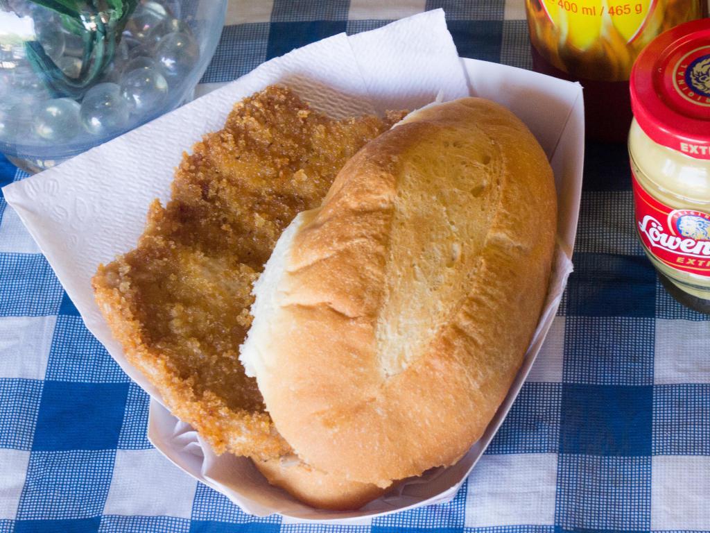 Schnitzel · Breaded pork cutlet on a roll.