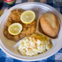 Wiener Schnitzel Plate · Breaded pork cutlet topped with lemon slices. Served with your choice of cold potato salad o...