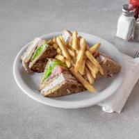Kitchen Club Sandwich · House roasted turkey or roast beef on triple-decker 7-grain toast with bacon, lettuce, tomat...