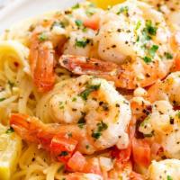 Shrimp Scampi · Sauteed with whole cloves of garlic, white wine, fresh basil and tomatoes, served over angel...