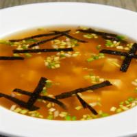 Miso Soup · Our special blend of red and white miso, tofu, diced leek and nori flakes.