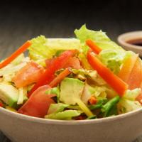 Tokyo Salad · Lettuce, cucumber, avocado, red pepper, mango, tomato, carrot and cashews drizzled w a ponzu...