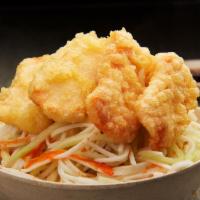 Salmon Tempura Salad · A bed of shredded kani mixed with cucumber and mayo topped with tempura'd salmon and drizzle...