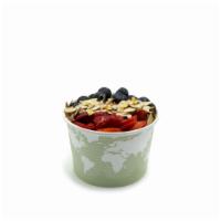 Blueberry, Strawberry, and Sliced Almonds Oatmeal Bowl · Steel cut and organic.